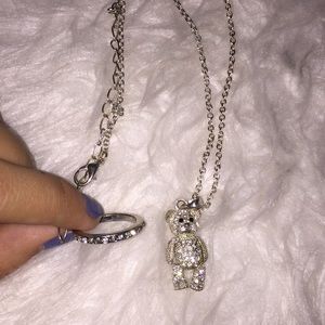 Silver diamond ring and diamond bear necklace